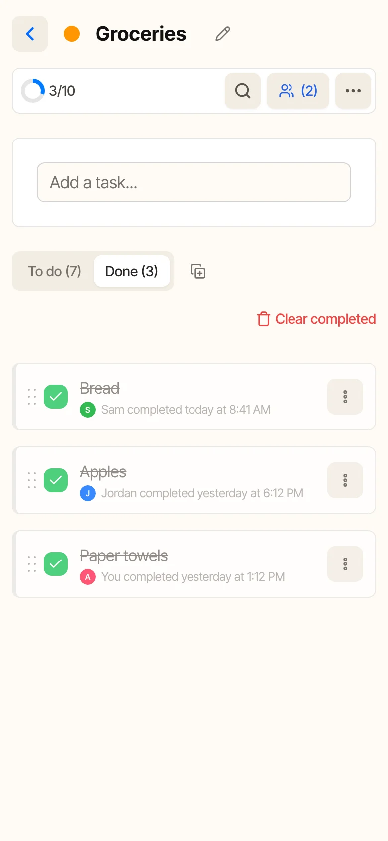The Done tab on the phone, with the name of whoever completed each task and the time.